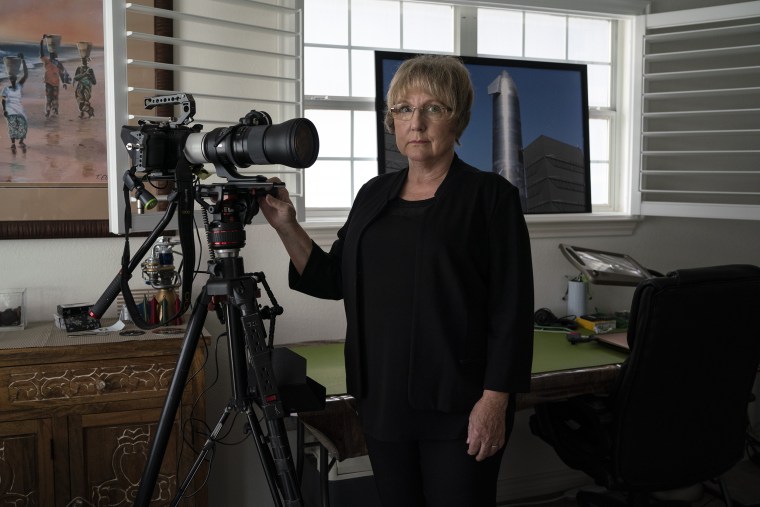 Image: Maria Pointer, who used to own a home with her husband between the SpaceX facilities and Boca Chica Village, poses for a photo in her new home in Port Isabel, Texas on Dec. 5, 2021.