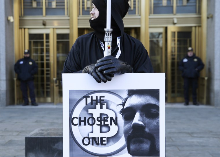 Image: A supporter of Ross William Ulbricht protests outside federal court during jury selection for his trial in New York Jan. 13, 2015.