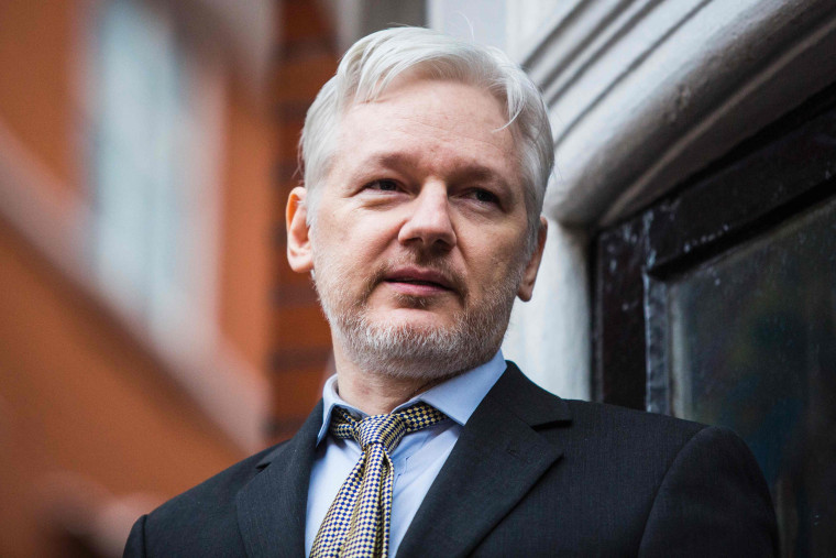 Image: ikiLeaks founder Julian Assange addressing the media