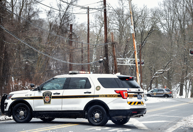 Pennsylvania State police block Glen Mills road after a powerline came down across the highway on Feb. 1, 2021.