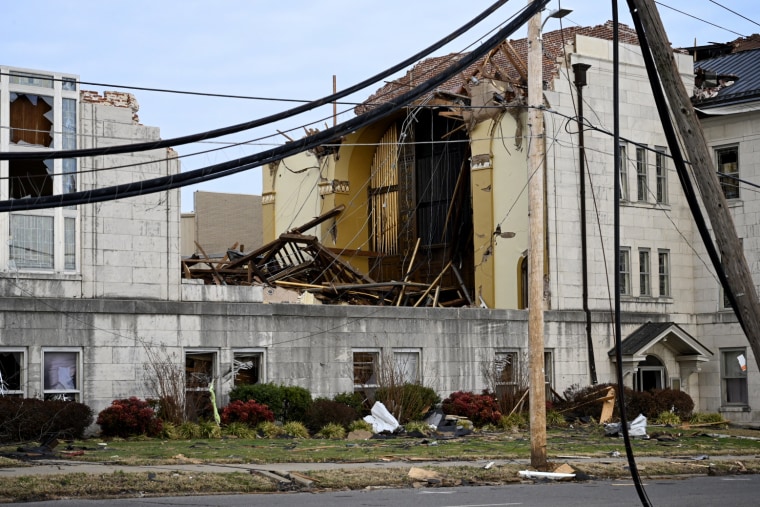Image: The pipes of a church organ are exposed by damaged cause by a tornado in Mayfield, Ky., on Saturday.