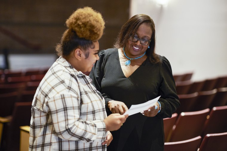 Saniyah Santana, left, a junior at Cesar Chavez High School in Phoenix talks with Sandra Jenkins, a high school business teacher who leads tours of Historically Black Colleges and Universities for interested students.