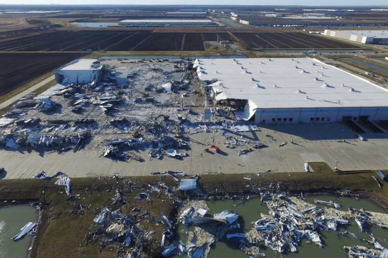 Image: Emergency vehicles surround the site of a roof collapse at an Amazon distribution centre in Edwardsville