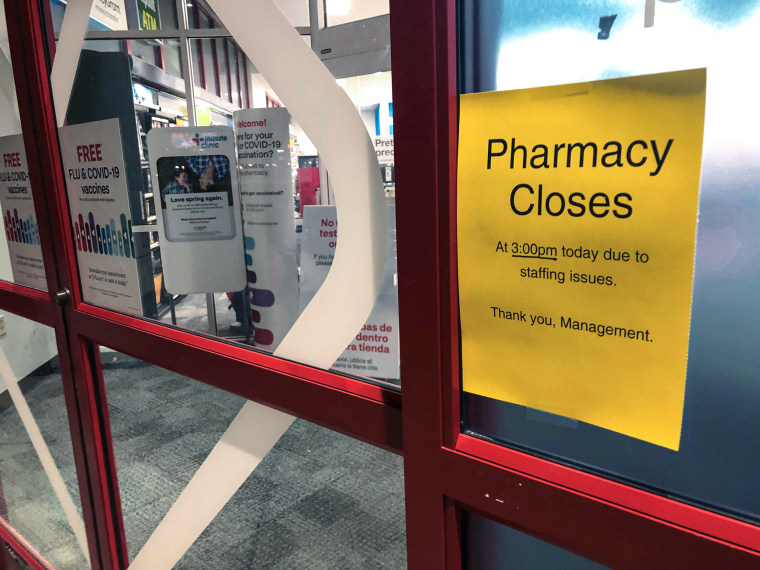 Image: A sign is posted outside a CVS pharmacy on Dec. 2, 2021 in Indianapolis