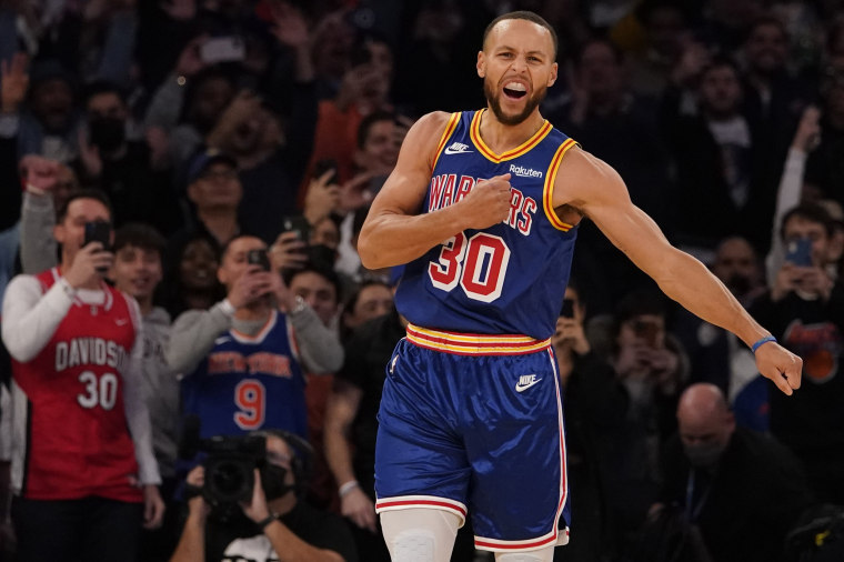 Image: Stephen Curry after scoring a 3-point basket during the first half of a game against the Knicks at Madison Square Garden in New York on Dec. 14, 2021.