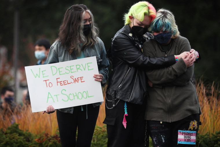 Students at Interlake High School in Bellevue, Wash., comfort one another during a protest Nov. 23 in response to the school's handling of cases of sexual assault.