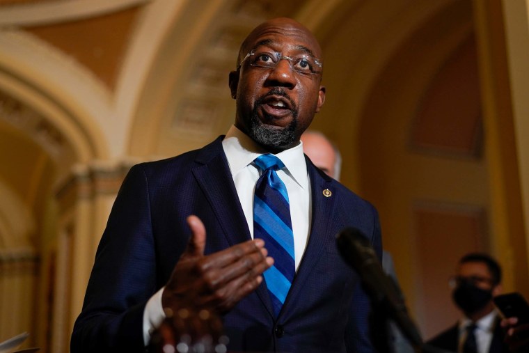 Sen. Raphael Warnock speaks during a news conference after the weekly Democratic policy luncheon on Capitol Hill in Washington on Tuesday, Dec. 7.
