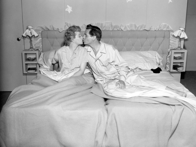 Image: Lucille Ball and Desi Arnaz portray Lucy Ricardo and Ricky Ricardo in  "I Love Lucy,"  on Jan. 1, 1952.