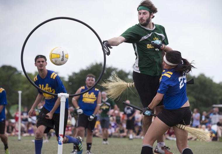 Image: A member of the Loyola University quidditch team scores against UCLA during their match at the Quidditch World Cup VI in Kissimmee, Fla., on April 14, 2013.