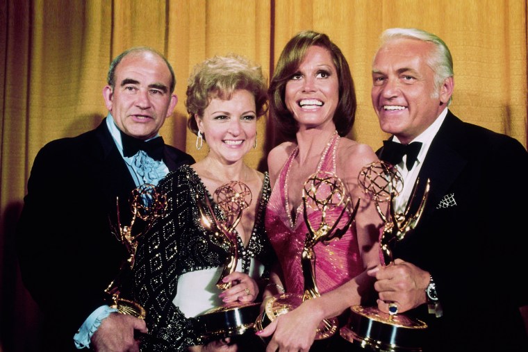 "The Mary Tyler Moore Show" co-stars Ed Asner, Betty White, Mary Tyler Moore and Ted Knight after they won Emmy Awards at the Shubert Theatre in Los Angeles on May 17, 1976.