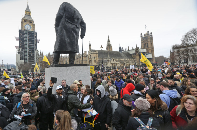 Demonstrators protesting Covid restrictions block Parliament Square in London on Dec. 18, 2021.