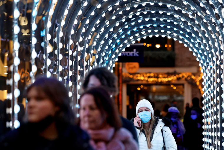 Pedestrians in central London on Dec. 18, 2021.