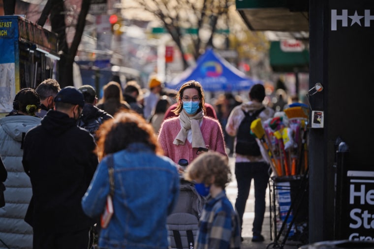 People line up to be tested for Covid-19 at a street-side testing booth in New York on Dec. 17, 2021.