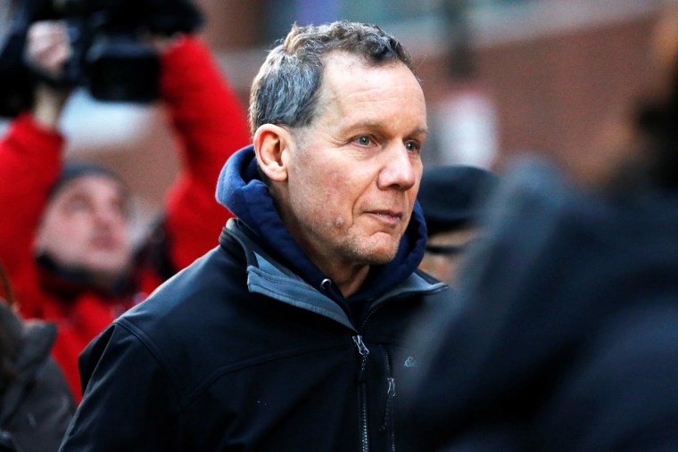 Charles Lieber leaves federal court after he and two Chinese nationals were charged with lying about their alleged links to the Chinese government in Boston on Jan. 30, 2020.