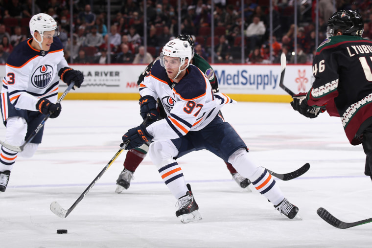 Image: Connor McDavid #97 of the Edmonton Oilers skates with the puck during a game on Nov. 24, 2021 in Glendale, Ariz.