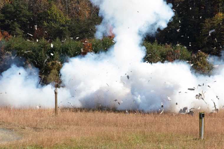 A homemade bomb is detonated at the FBI’s explosives training range in Quantico, Va.