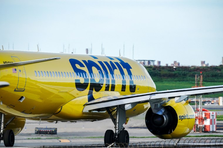 A Spirit Airlines aircraft takes off at La Guardia Airport
