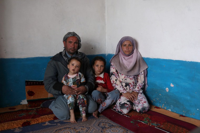 Image: The Wider Image: For struggling Afghan family, the next meal is a matter of faith