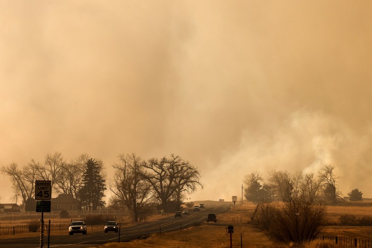 Image: Wind-driven wildfires prompted an evacuation order for the entire town of Superior