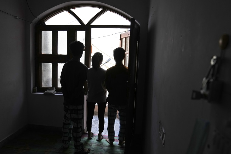 A Myanmar refugee, 21, who fled with her two younger brothers during the violence in the town of Matupi in northwestern Myanmar, at an undisclosed location, in India. 