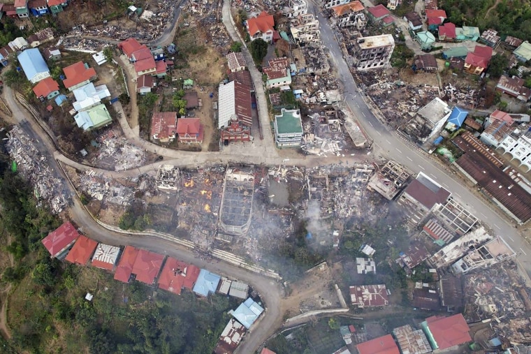 A closer view of Thantlang after fires destroyed numerous buildings.