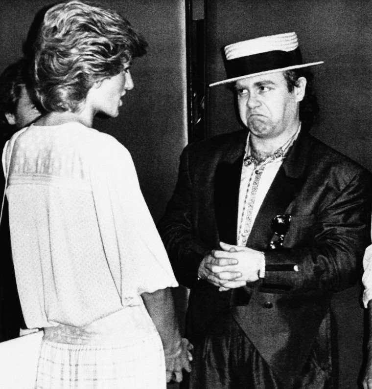 Princess Diana and Elton John at the Live Aid famine relief concert for Africa in 1985. 