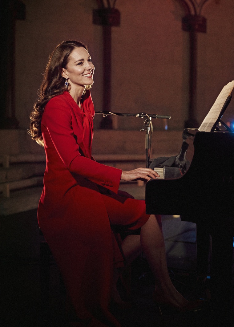 In this image released December 24, 2021, Catherine, Duchess of Cambridge accompanies singer Tom Walker on the piano during a performance of his song 'For Those Who Can't Be Here' during Royal Carols - Together At Christmas, a Christmas carol concert host