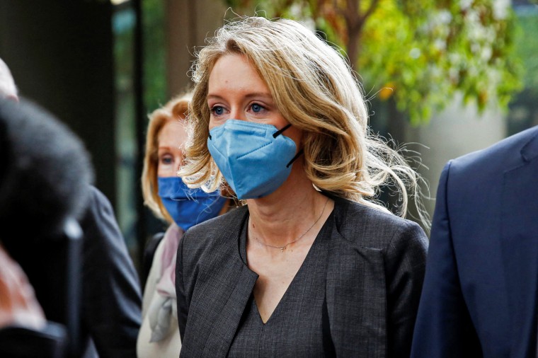 Theranos founder Elizabeth Holmes arrives for her fraud trial at federal court in San Jose, Calif., on Jan. 3, 2022.