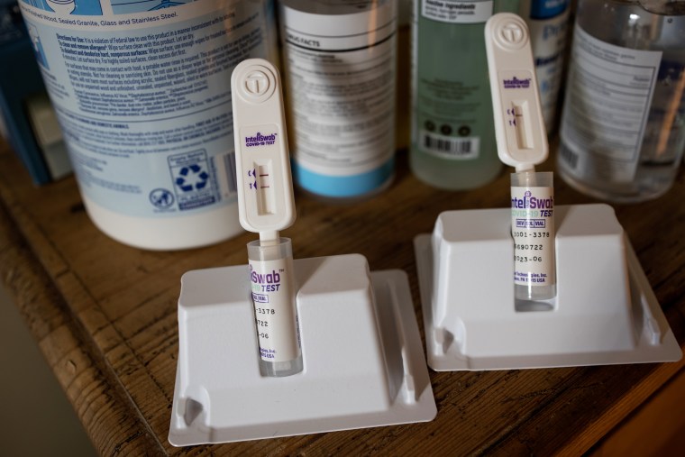 Two lines on a rapid at-home Covid-19 test indicate a positive result on Dec. 24, 2021, in Brooklyn, N.Y.