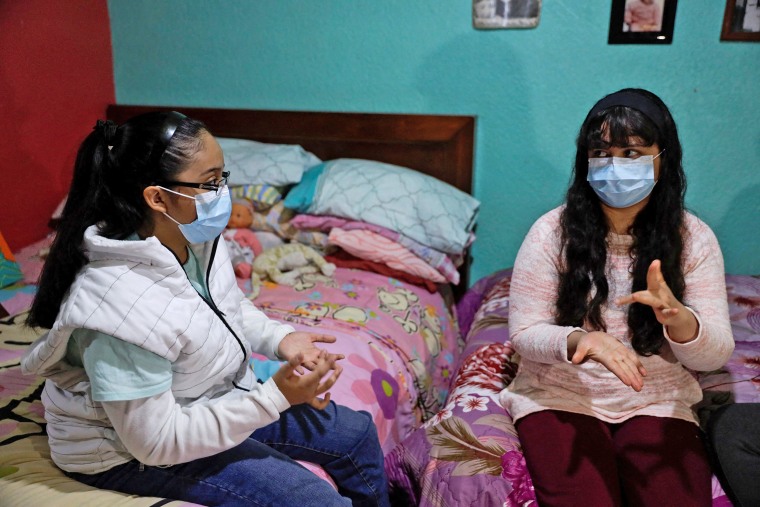 Image: Estrella Salazar, 17, who is developing a sign-language translation app with her sister Perla, at her house in Nezahualcoyotl, Mexico, on Dec. 30, 2021.