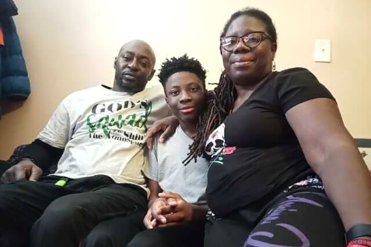 Image: Amanda Kamara on the right, her husband Keith Lewis and their 13-year-old son Kevon Kamara-Lewis.
