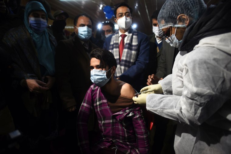 A student receives a Covid-19 vaccination on Jan. 3, 2022, in Srinagar, India.