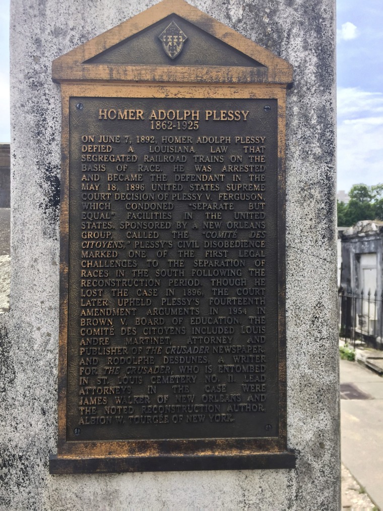 A marker on the burial site for Homer Plessy at St. Louis No. 1 Cemetery in New Orleans, on June 3, 2018.