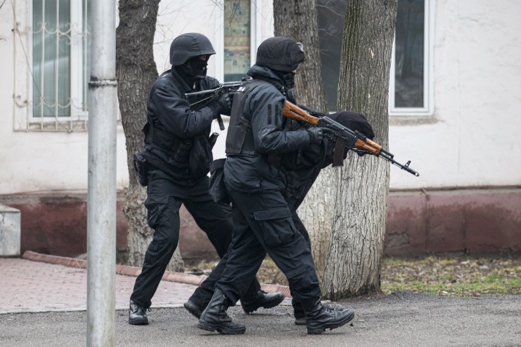 Image: Armed riot police officers during clashes in Almaty, Kazakhstan, on Jan. 8, 2022.