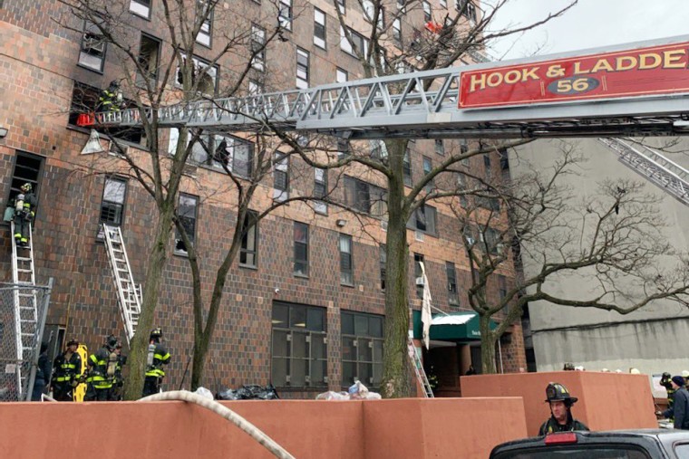 Image: Firefighters respond to a fire in the Bronx, N.Y., on Jan. 9, 2022.