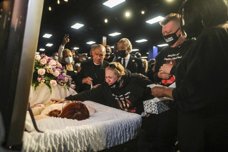 Image: The Rev. Al Sharpton and mother Soledad Peralta grieve at the funeral for 14-year-old Valentina Orellana-Peralta at the City of Refuge Church in Gardena, Calif., on Jan. 10, 2022.