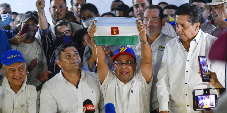 Opposition candidate Sergio Garrido celebrates Sunday after ruling-party candidate Jorge Arreaza admitted on social media that he had lost a rerun of the governor’s election in Barinas, Venezuela.