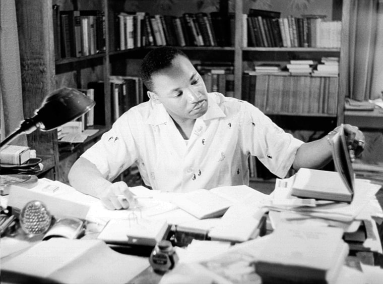 Reverend Martin Luther King, Jr. relaxes at home in May 1956 in Montgomery, AL.