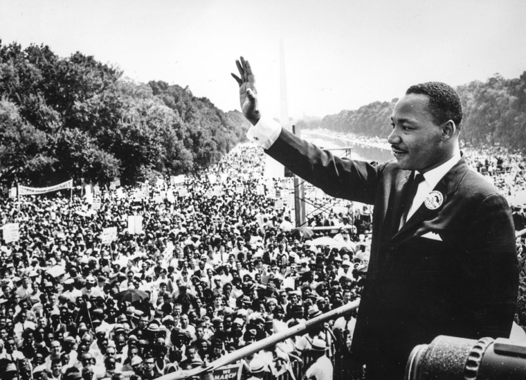 Martin Luther King Jr., waves to supporters on Aug. 28, 1963 on the Mall in Washington D.C. during the "March on Washington".