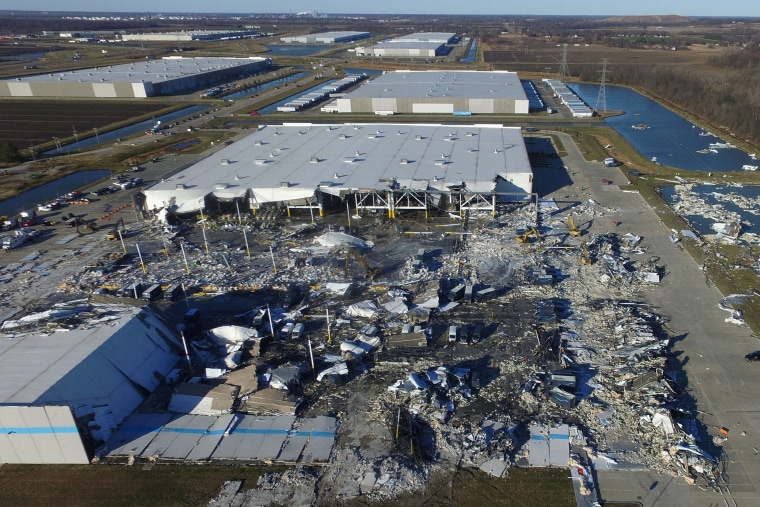 Image: The site of a roof collapse at an Amazon.com distribution center a day after a series of tornadoes in Edwardsville, Ill., on Dec. 11, 2021.