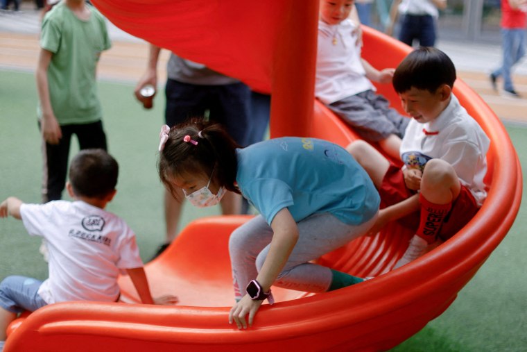Image: FILE PHOTO: Children at a playground inside a shopping complex in Shanghai