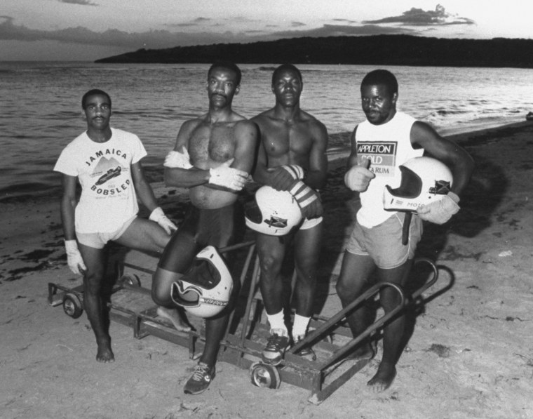 Image: Jamaican Bobsled team, from left, Michael White, Dudley Stokes, Devon Harris and Frederick Powell.