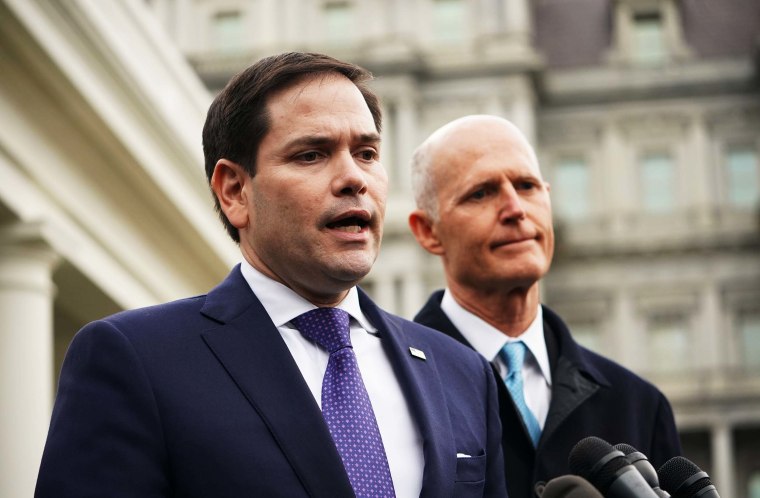 Florida senators Marco Rubio and Rick Scott speak to reporters after a meeting with former President Donald Trump on Venezuela on January 22, 2019.