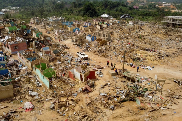 Image: A view shows debris of houses and other buildings that were destroyed in a blast in Apiate