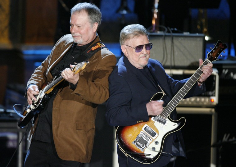 FILE - Bob Spalding, left, and Don Wilson of The Ventures perform at the Rock and Roll Hall of Fame Induction Ceremony in New York, March 10, 2008. Don Wilson, co-founder and rhythm guitarist of the instrumental guitar band The Ventures, has died. He was 88. The News Tribune reports Wilson died Saturday, Jan. 22, 2022 in Tacoma of natural causes, surrounded by his four children. (AP Photo/Jason DeCrow)