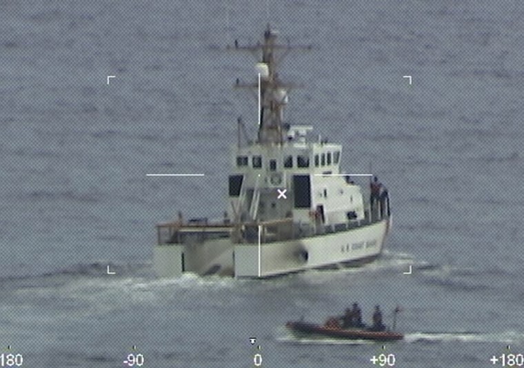 Coast Guard Cutter Ibis' crew searching for people missing from a capsized boat off the coast of Florida, on  Jan. 25, 2022.