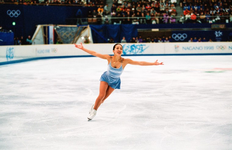 image: Michelle Kwan competes during the long program at the Winter Olympics in Nagano, Japan, in 1998.