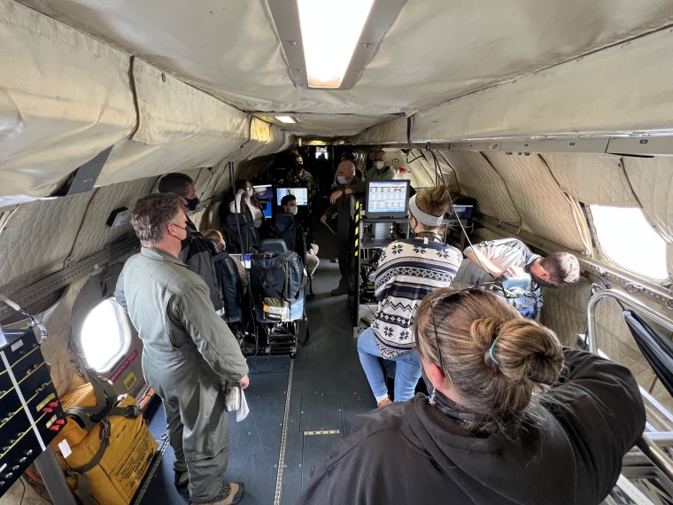 A flight safety brief aboard the P-3 aircraft at Wallops Flight Facility.