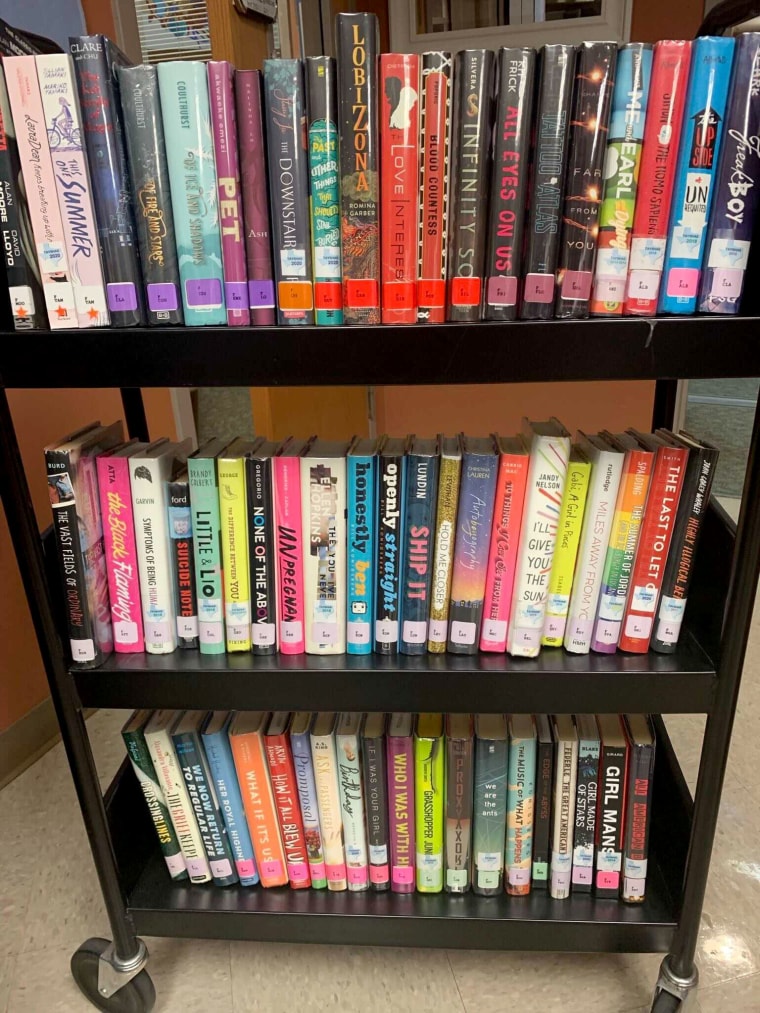 A photo taken by a teacher shows a cart full of books as they were being removed from a North East ISD library in December.