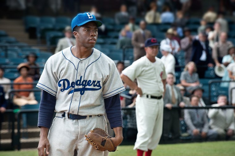 Chadwick Boseman portrays Jackie Robinson.